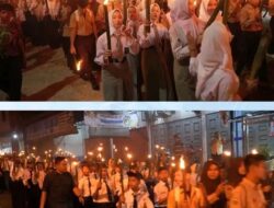 Semarak HUT ke-80 RI, Bupati Labusel Fery Sahputra Pimpin Upacara Taptu dan Pawai Obor